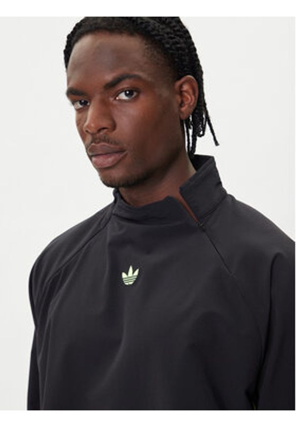 Adidas - adidas Bluza adicolor Woven Drill JW5957 Czarny Loose Fit. Kolor: czarny. Materiał: syntetyk