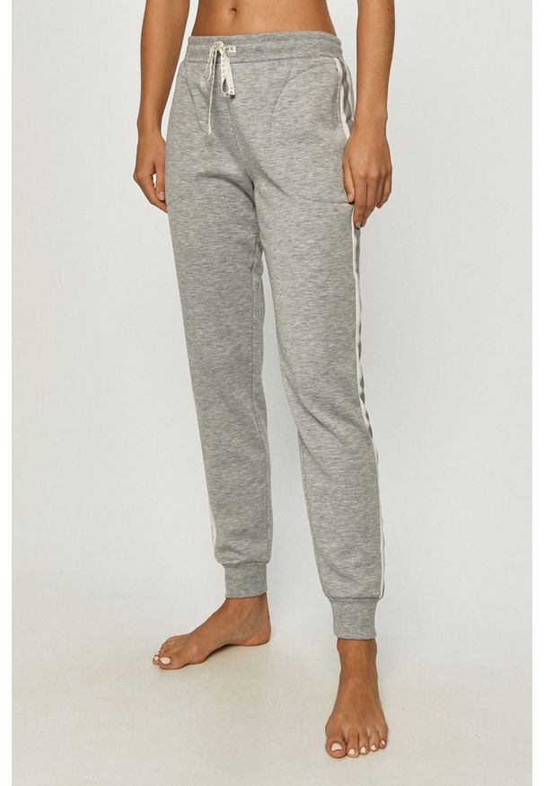 DKNY - Dkny - Spodnie piżamowe. Kolor: szary. Materiał: poliester, dzianina, elastan. Wzór: aplikacja