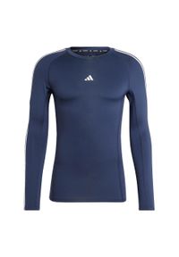 Adidas - Koszulka TECHFIT Compression Training 3-Stripes Long Sleeve. Kolor: niebieski. Materiał: materiał. Długość rękawa: długi rękaw. Technologia: Techfit (Adidas). Sport: fitness
