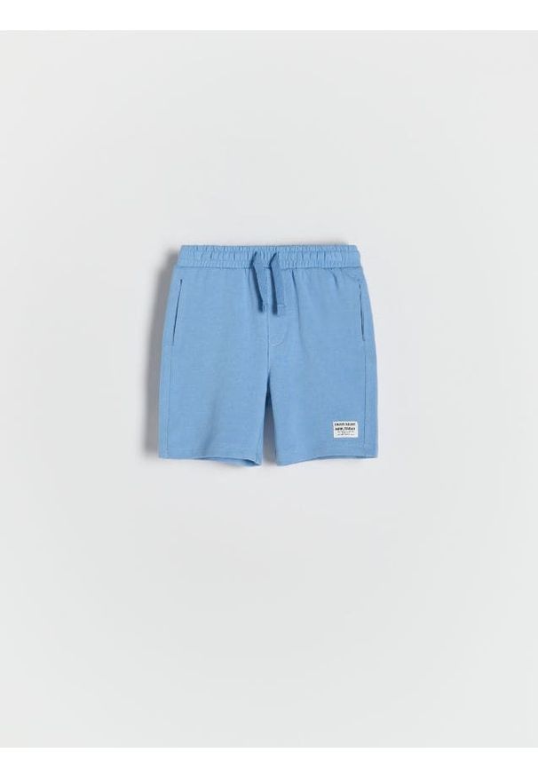 Reserved - Bawełniane szorty - niebieski. Kolor: niebieski. Materiał: bawełna. Wzór: gładki