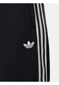 Adidas - adidas Spodnie dresowe adicolor Firebird JV7525 Czarny Regular Fit. Kolor: czarny. Materiał: syntetyk #4