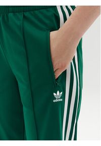Adidas - adidas Spodnie dresowe adicolor Classics Firebird JC8284 Zielony Regular Fit. Kolor: zielony. Materiał: syntetyk #2