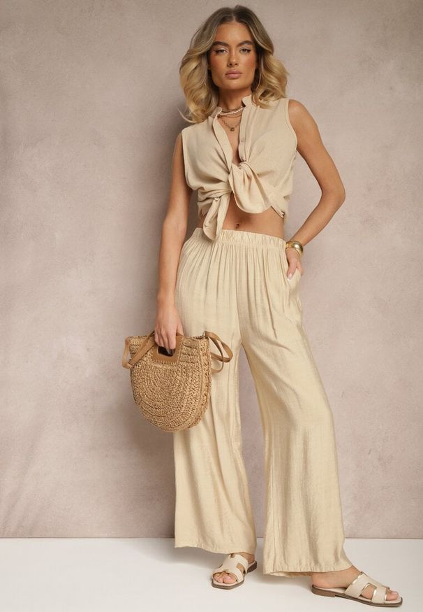 Renee - Beżowe Spodnie Palazzo o Szerokim Kroju High Waist Lislevia. Okazja: na co dzień. Stan: podwyższony. Kolor: beżowy. Styl: elegancki, casual