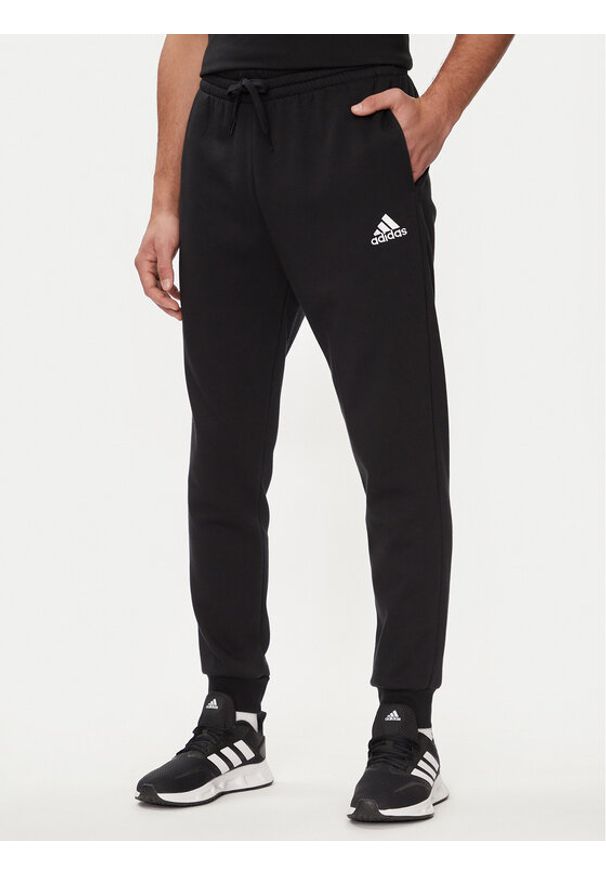 Adidas - adidas Spodnie dresowe Essentials Fleece Regular Tapered Joggers HL2236 Czarny Regular Fit. Kolor: czarny. Materiał: bawełna