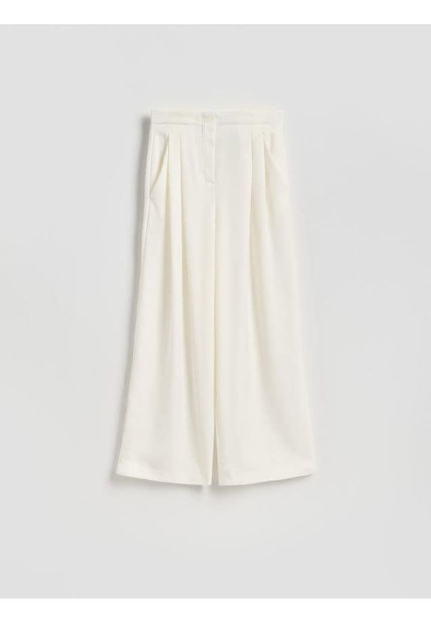 Reserved - Spodnie z lyocellem - złamana biel. Materiał: tkanina. Wzór: gładki