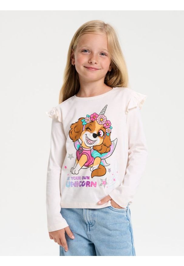 Sinsay - Bawełniana koszulka z falbanką PAW Patrol - kremowy. Kolor: kremowy. Materiał: bawełna