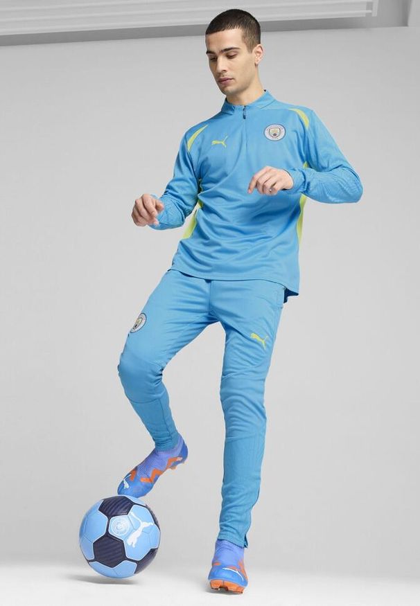 Puma - Męskie spodnie treningowe Manchester City PUMA Magic Blue Yellow Glow. Kolor: żółty, wielokolorowy, niebieski