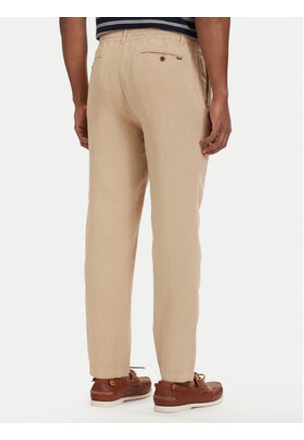 Polo Ralph Lauren Spodnie materiałowe 710940611010 Beżowy jasny Tapered Fit. Kolor: beżowy. Materiał: len
