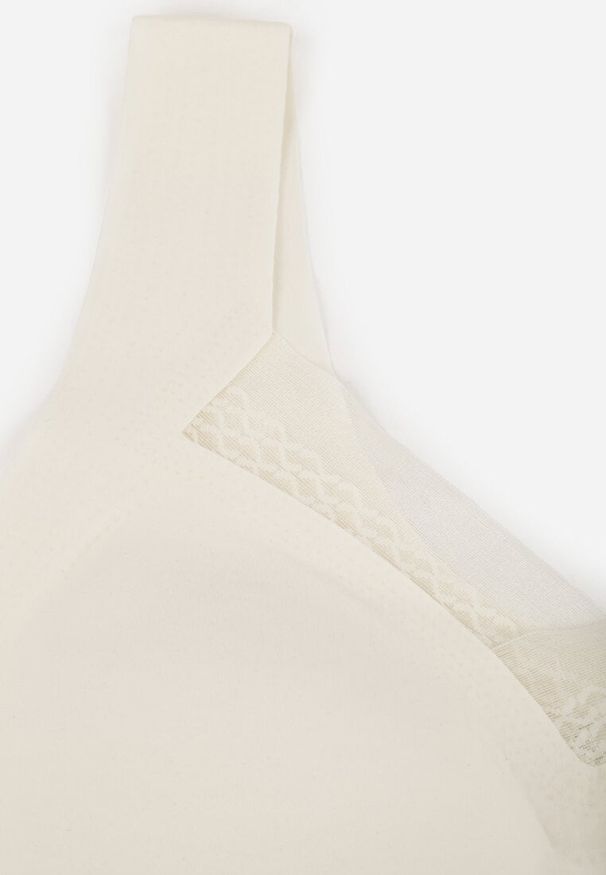 Renee - Biały Sportowy Biustonosz z Usztywnieniem Ozdobiony Siateczkową Wstawką Edalissa. Kolor: biały. Rodzaj stanika: wyciągane miseczki. Wzór: aplikacja