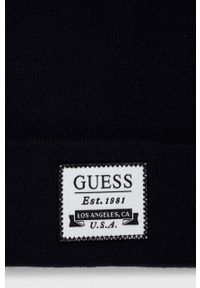 Guess czapka z domieszką wełny kolor granatowy z grubej dzianiny. Kolor: niebieski. Materiał: wełna, dzianina #3