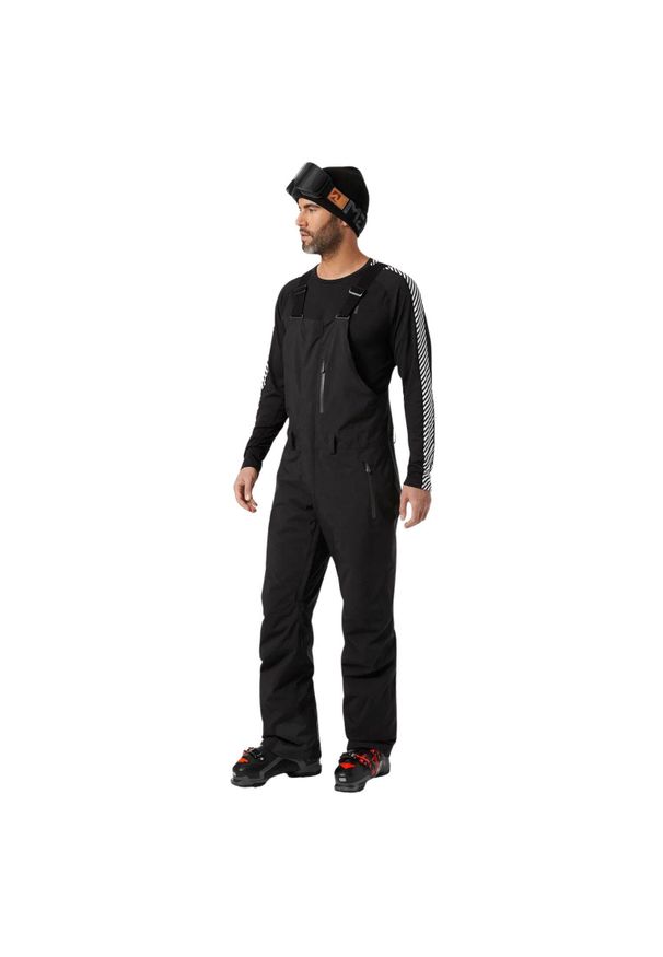 Kombinezon narciarski Helly Hansen legendary insulated bib. Kolor: szary, wielokolorowy, czarny. Sezon: zima. Sport: narciarstwo