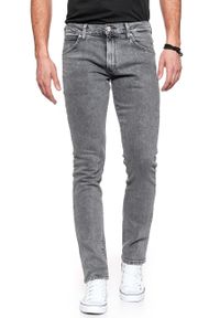 Wrangler - SPODNIE MĘSKIE WRANGLER LARSTON BLEACHED BLACK W18SRA24P 112127609. Stan: obniżony
