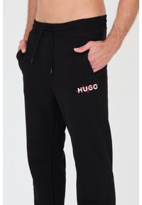Hugo - HUGO Czarne dresowe spodnie Drokko. Kolor: czarny. Materiał: dresówka