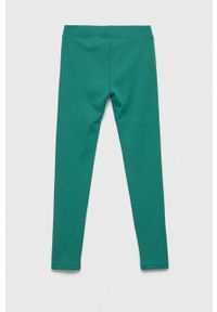 Guess legginsy dziecięce kolor zielony z nadrukiem. Kolor: zielony. Wzór: nadruk #2