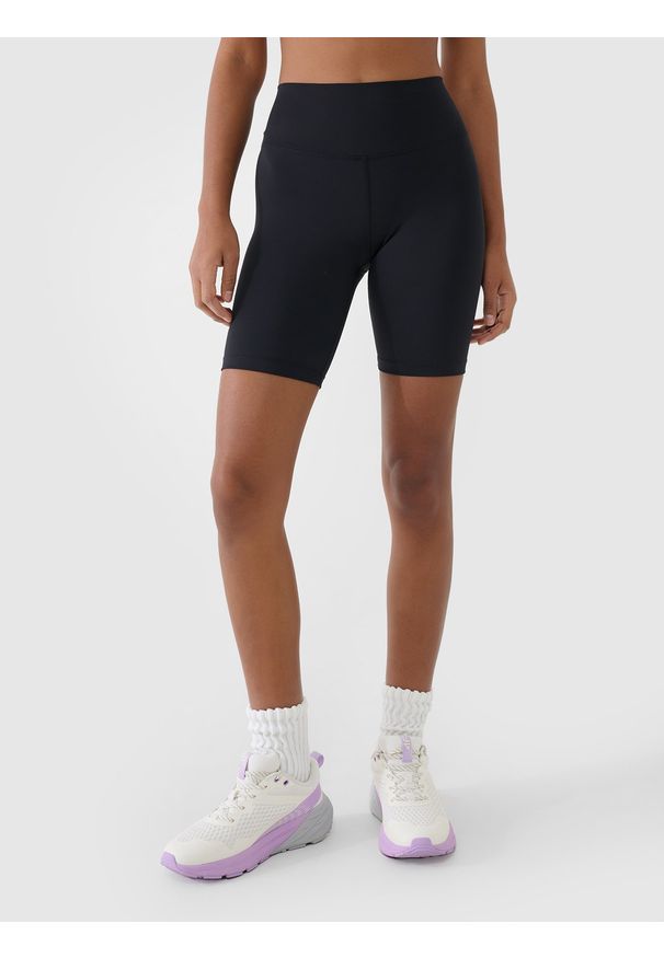 4f - 4F Legginsy kolarki treningowe damskie - czarne M. Kolor: czarny. Materiał: dzianina, włókno, poliester, materiał, elastan. Wzór: gładki, ze splotem, jednolity. Sport: fitness