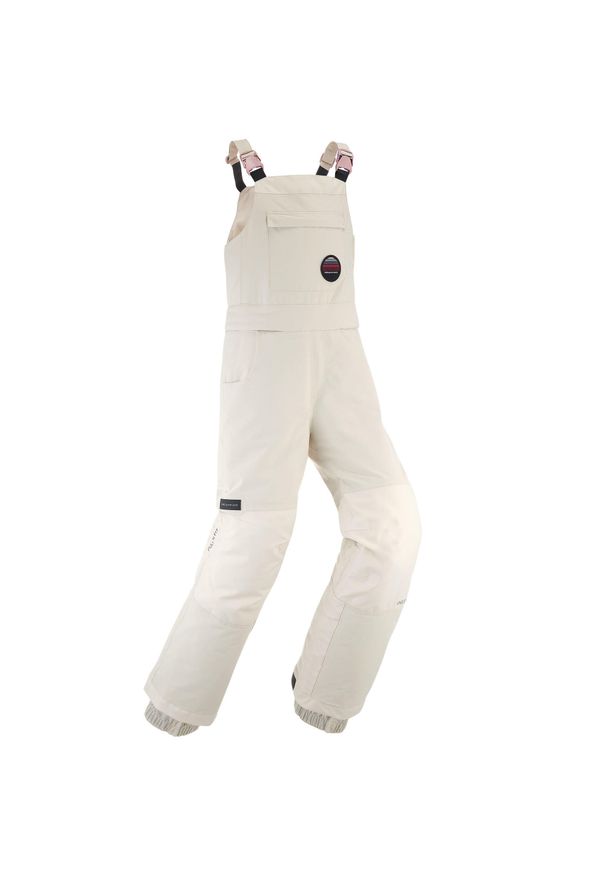 DREAMSCAPE - Spodnie snowboardowe ogrodniczki dla dzieci Dremscape BIB 500. Kolor: beżowy. Materiał: polar, materiał. Sezon: zima. Sport: snowboard