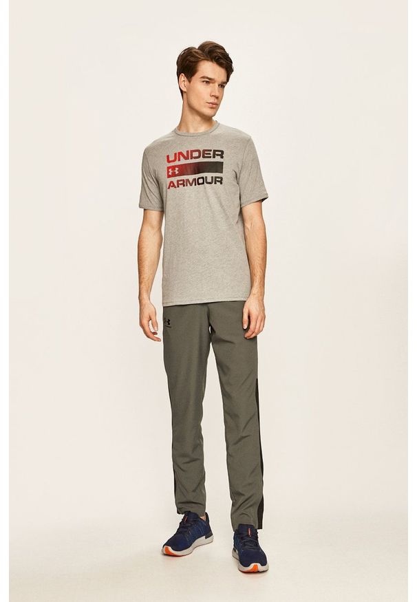 Under Armour - T-shirt. Kolor: szary. Materiał: dzianina. Wzór: nadruk