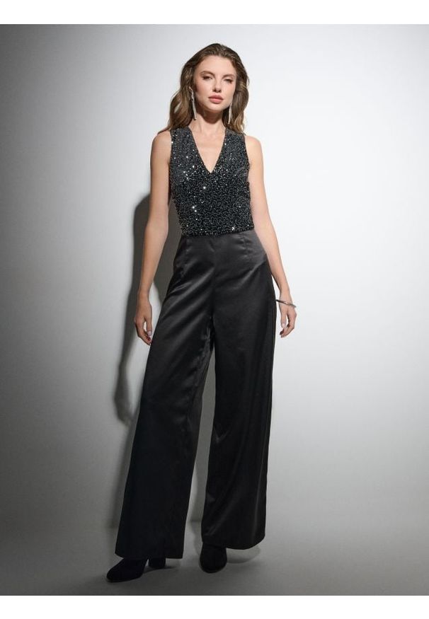 Sinsay - Kombinezon z cekinami - czarny. Kolor: czarny
