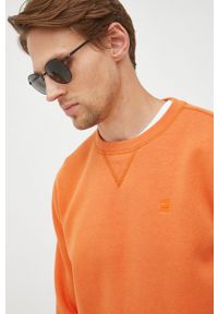 G-Star RAW - G-Star Raw Bluza męska kolor pomarańczowy. Kolor: pomarańczowy. Materiał: dzianina, poliester. Wzór: gładki