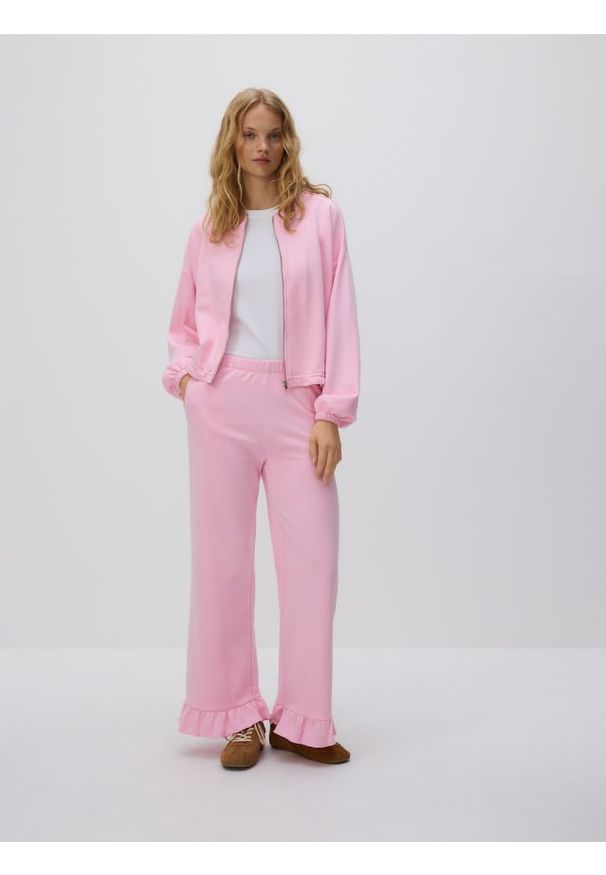 Reserved - Spodnie z falbankami - różowy. Kolor: różowy. Materiał: dzianina, bawełna