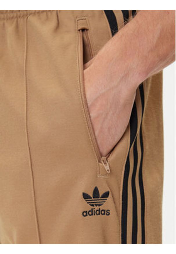 Adidas - adidas Spodnie dresowe adicolor Classics Beckenbauer JY1276 Beżowy Slim Fit. Kolor: beżowy. Materiał: syntetyk