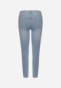 Born2be - Jasnoniebieskie Jeansy o Fasonie Skinny z Minimalistycznymi Przedarciami Orivea. Kolor: niebieski #6