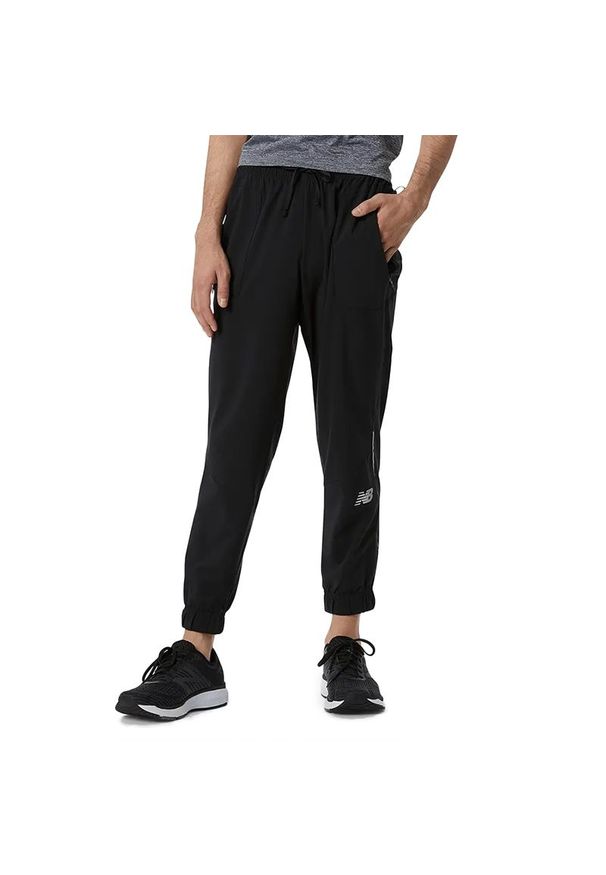 Spodnie New Balance MP21272BK - czarne. Kolor: czarny. Materiał: materiał. Sport: fitness