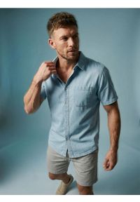 Sinsay - Bawełniana koszula z krótkim rękawem - niebieski. Kolor: niebieski. Materiał: bawełna. Długość rękawa: krótki rękaw. Długość: krótkie