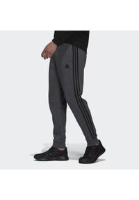 Adidas - Spodnie męskie adidas Essentials Tapered Cuff 3 Stripes. Kolor: szary, wielokolorowy, czarny. Materiał: bawełna, materiał. Sport: joga i pilates #1