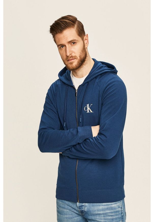 Calvin Klein Underwear - Bluza CK One. Typ kołnierza: kaptur. Kolor: niebieski. Materiał: bawełna, materiał, dzianina, elastan, poliester. Długość rękawa: raglanowy rękaw. Wzór: melanż