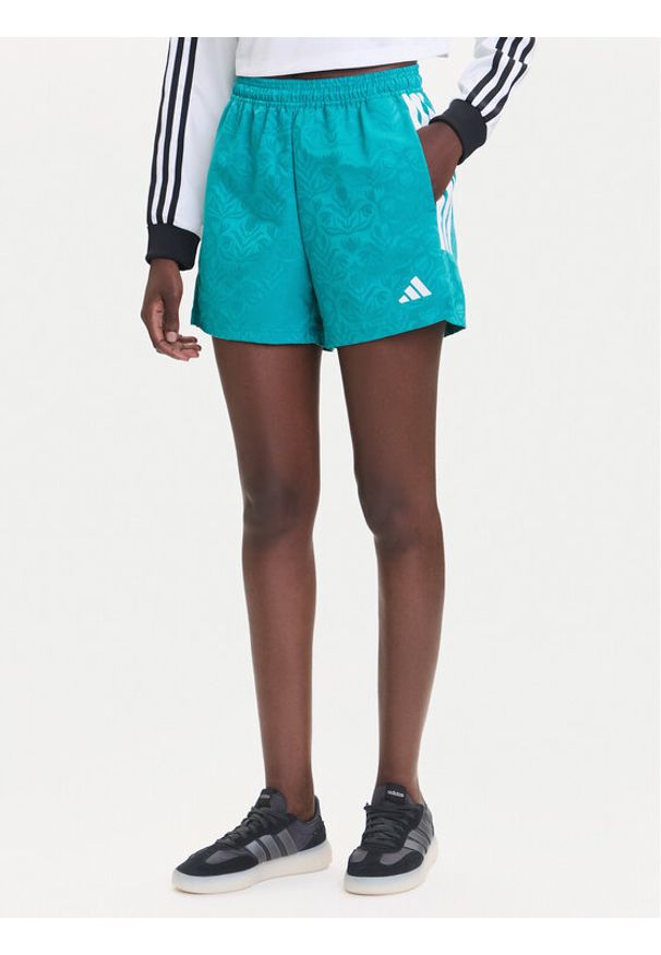 Adidas - adidas Szorty sportowe Tiro x Common Goal JL9208 Turkusowy Loose Fit. Kolor: turkusowy. Materiał: syntetyk