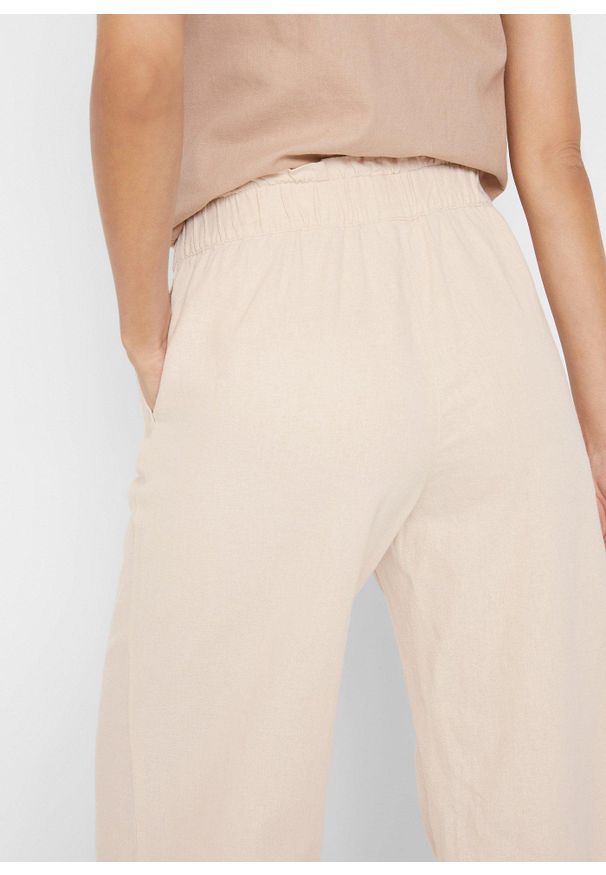 bonprix - Spodnie culotte z lnem, o regulowanej długości. Kolor: beżowy. Materiał: len
