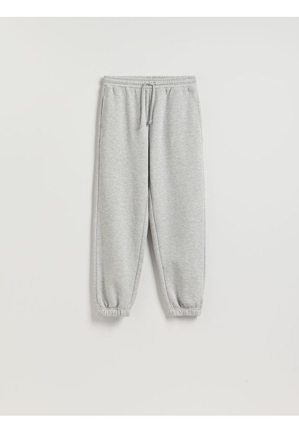 Reserved - Spodnie dresowe ze ściągaczem - jasnoszary. Kolor: szary. Materiał: dresówka