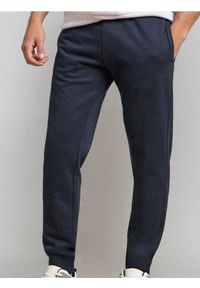 Sinsay - Spodnie jogger - granatowy. Kolor: niebieski
