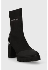 Calvin Klein Jeans botki PLATFORM KNIT SOCK KNIT WN damskie kolor czarny na słupku YW0YW01196. Nosek buta: okrągły. Kolor: czarny. Materiał: skóra. Obcas: na platformie. Wysokość obcasa: średni #2
