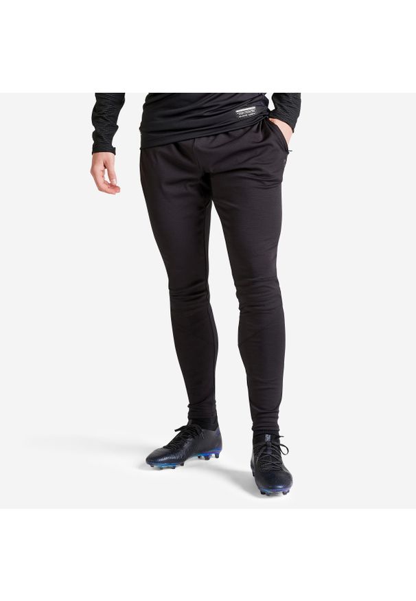 KIPSTA - Spodnie dresowe piłkarskie dla dorosłych Kipsta CLR. Kolor: czarny, szary, wielokolorowy. Materiał: dresówka. Sport: piłka nożna