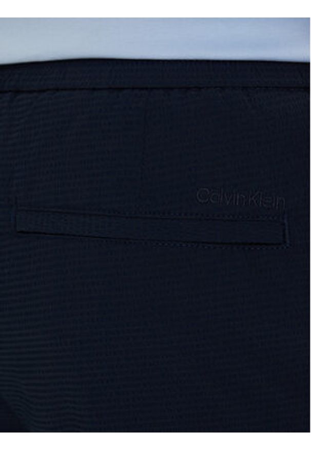 Calvin Klein Szorty materiałowe LV04LF610G Niebieski Straight Fit. Kolor: niebieski. Materiał: syntetyk