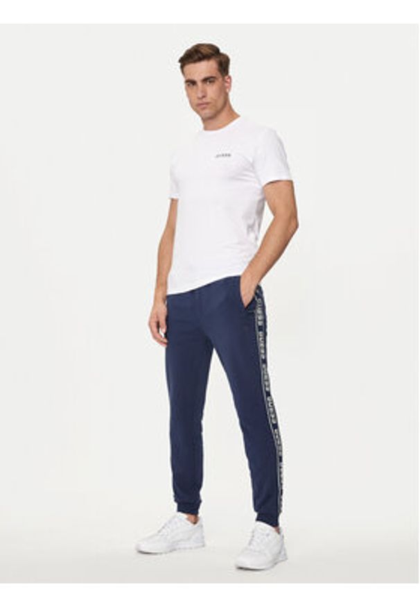 Guess Spodnie dresowe Z2YB19 K6ZS1 Granatowy Regular Fit. Kolor: niebieski. Materiał: bawełna