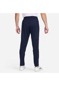 Nike - Spodnie sportowe męskie Dri-FIT Park 20 Knit Pants. Kolor: niebieski, wielokolorowy, biały. Materiał: poliester. Technologia: Dri-Fit (Nike). Sport: piłka nożna