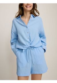 Reserved - Szorty z bawełnianego muślinu - jasnoniebieski. Kolor: niebieski. Materiał: bawełna