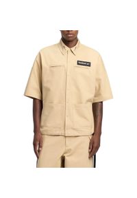 Kurtka Reebok Model S S Shirt Kolor Jasnobrązowy. Kolor: brązowy, wielokolorowy, beżowy. Materiał: tkanina
