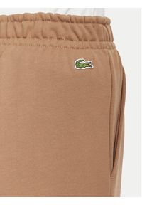 Lacoste Spodnie dresowe XF5268 Beżowy Regular Fit. Kolor: beżowy. Materiał: bawełna #2