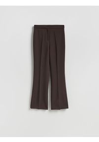 Reserved - Spodnie z rozcięciem - ciemnobrązowy. Kolor: brązowy. Materiał: tkanina, wiskoza #1