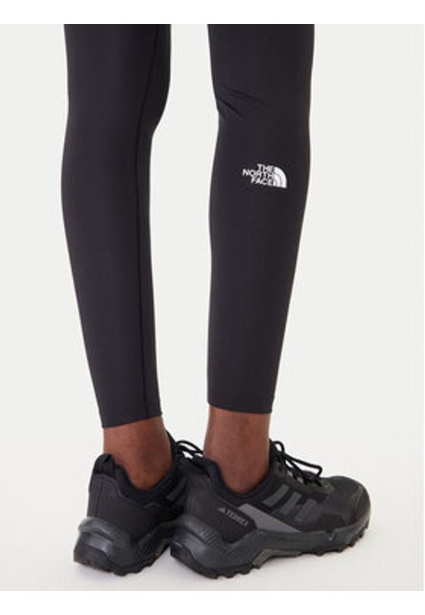 The North Face Legginsy Flex NF0A8EJB Czarny Slim Fit. Kolor: czarny. Materiał: syntetyk