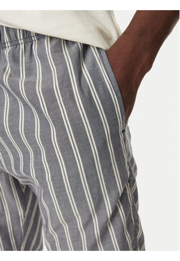 United Colors of Benetton - United Colors Of Benetton Spodnie piżamowe 42FK4F00A Granatowy Regular Fit. Kolor: niebieski. Materiał: bawełna