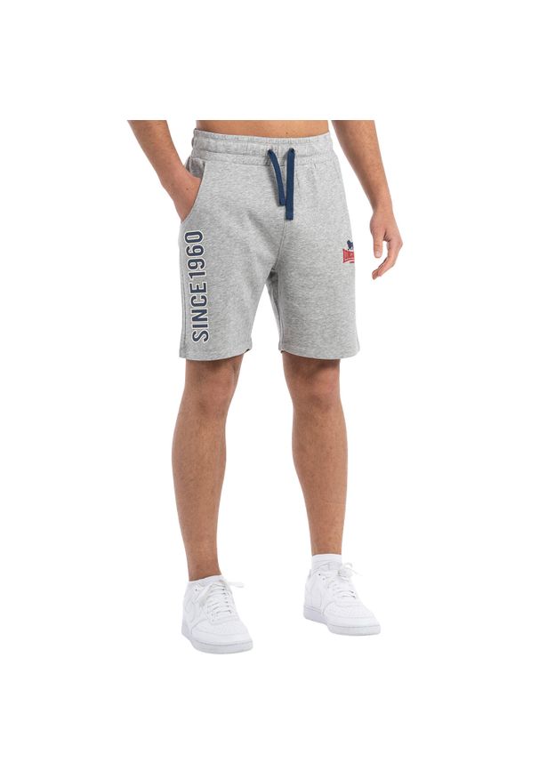 Krótka regularna fryzura Lonsdale Skaill. Kolor: niebieski, szary, wielokolorowy. Długość: krótkie. Sport: fitness