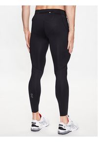 On Legginsy Performance Tights M 1MD10130553 Czarny Slim Fit. Kolor: czarny. Materiał: syntetyk