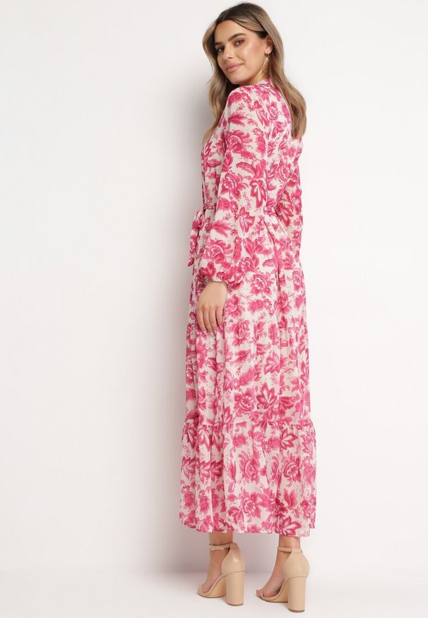 Born2be - Fuksjowa Sukienka Maxi w Kwiaty z Guzikami i Materiałowym Paskiem Kinzey. Okazja: na co dzień, na imprezę. Typ kołnierza: dekolt w serek. Kolor: różowy. Wzór: kwiaty. Typ sukienki: rozkloszowane. Materiał: materiał. Sezon: lato. Styl: casual, elegancki. Długość: maxi