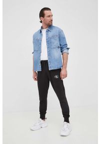 Calvin Klein Jeans Spodnie bawełniane męskie kolor czarny gładkie. Kolor: czarny. Materiał: bawełna. Wzór: gładki