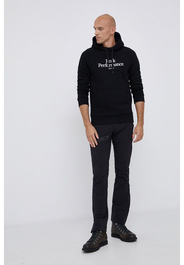 Peak Performance Bluza męska kolor czarny z kapturem gładka. Typ kołnierza: kaptur. Kolor: czarny. Materiał: bawełna, dzianina. Długość rękawa: raglanowy rękaw. Wzór: gładki